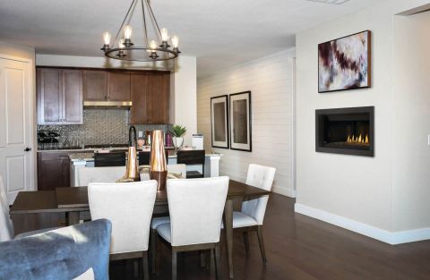 Dining room with wall fireplace